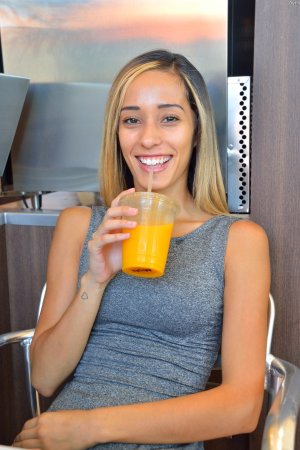 Averie FTV rubs cunt right after drinking her juice photo 9
